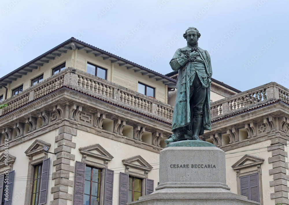 Bronze statue of the Italian philosopher and politician Cesare Beccaria in Milan, Lombardy, Italy with selective focus