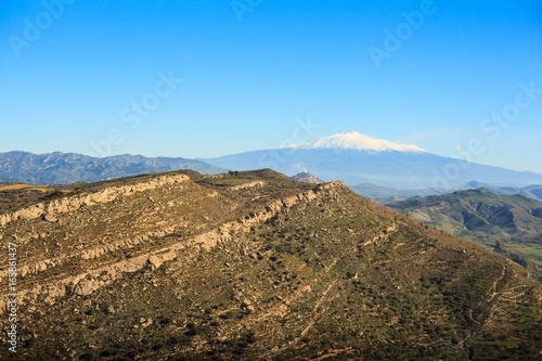View of Etna volcano and Sicily field