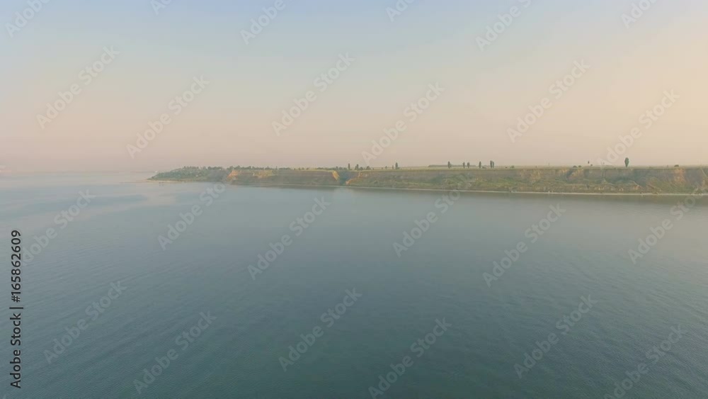 Aerial view of bay near sea and cliffs Aerial view of bay near sea and cliffs