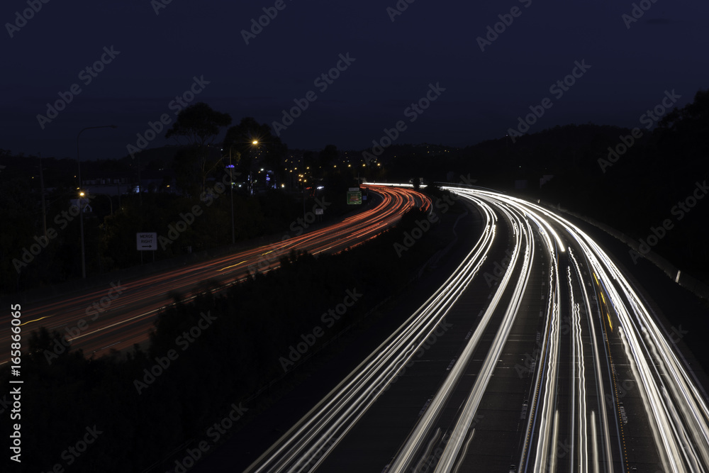 motorway highway road car light trails at night time australia
