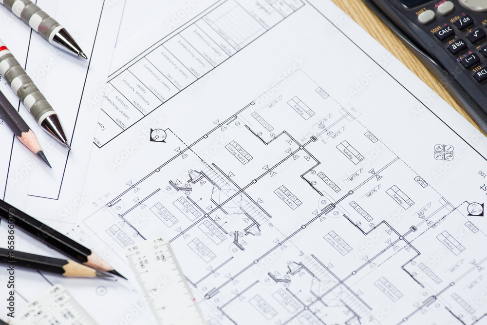 Abstract engineering drawings background with blank for your word. Construction plan tools with empty space on desk. Abstract engineering drawings background with blank for your word. Construction plan tools with empty space on desk.