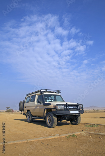 Safari transport in the plain of Serengeti, Tanzania