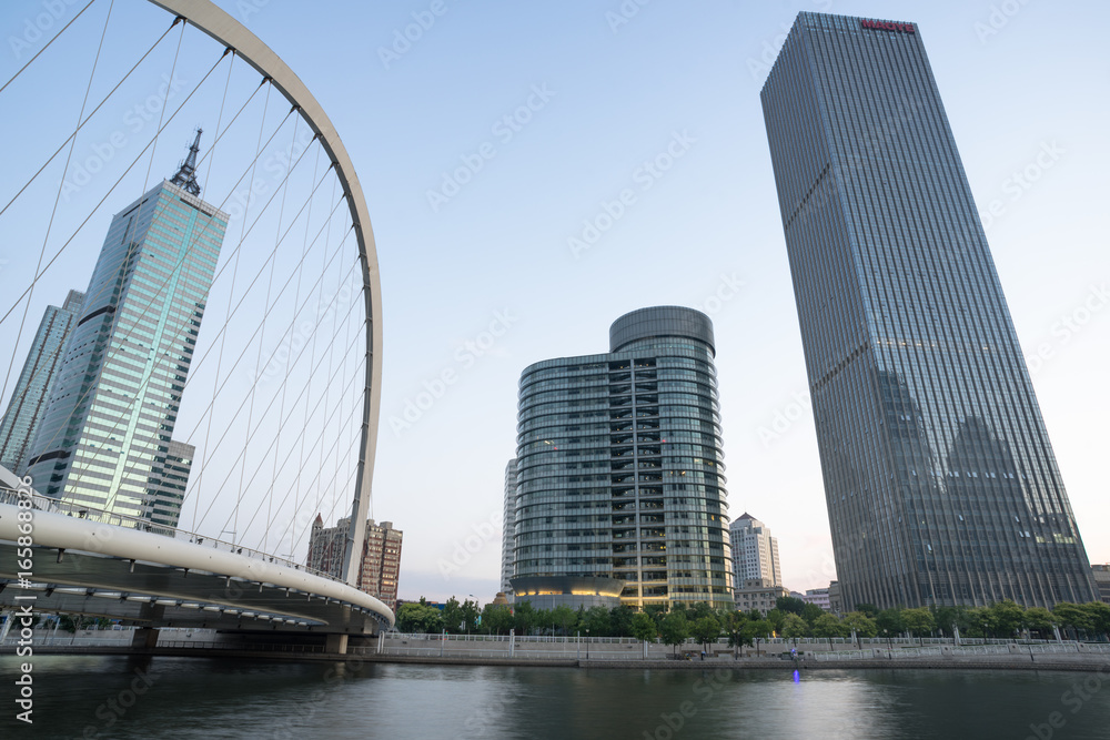 Obraz premium Tianjin city waterfront downtown skyline with Haihe river,China.