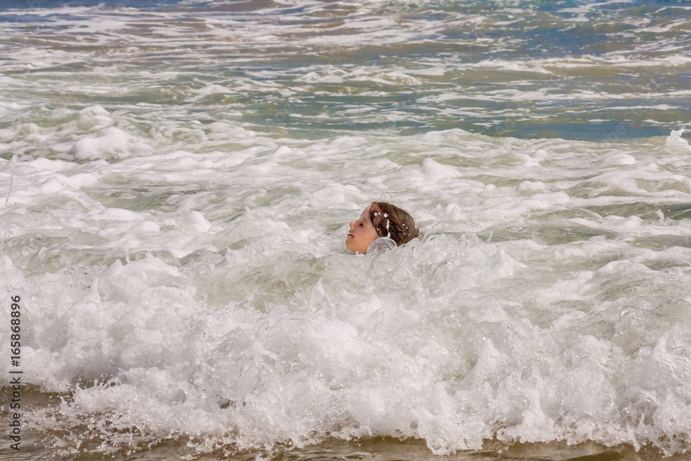 Young Girl Head In Shallow Ocean Waves Young Girl Head In Shallow Ocean Waves