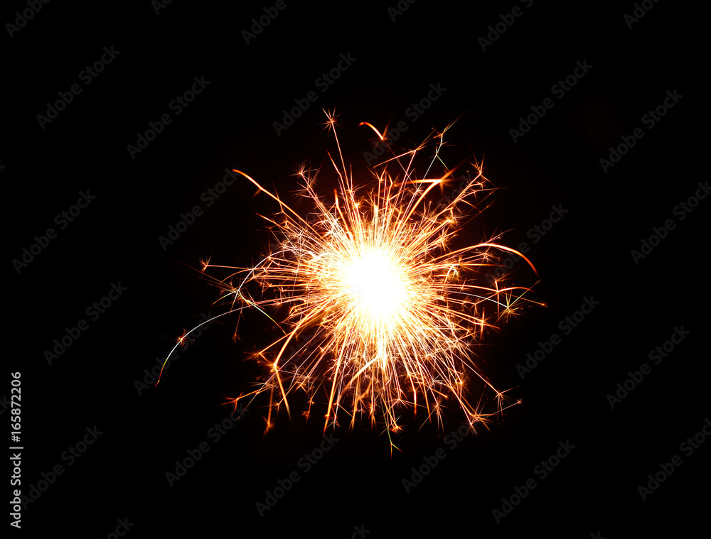 sparkler or firework on dark night background