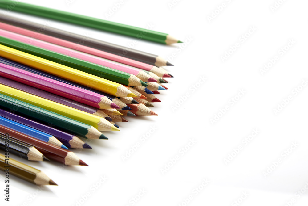 Many different colored pencils on white background Many different colored pencils on white background