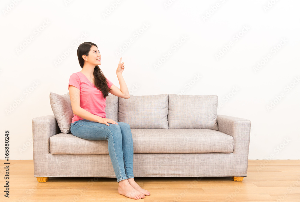 woman showing gestures pointing with copyspace woman showing gestures pointing with copyspace