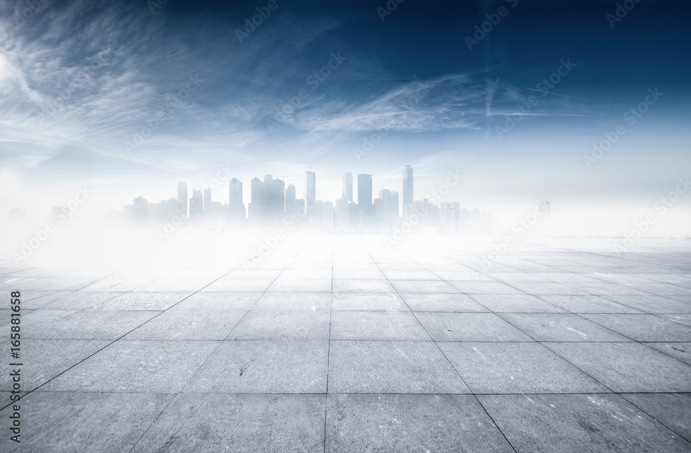 Panoramic skyline and buildings with empty concrete square floor Panoramic skyline and buildings with empty concrete square floor