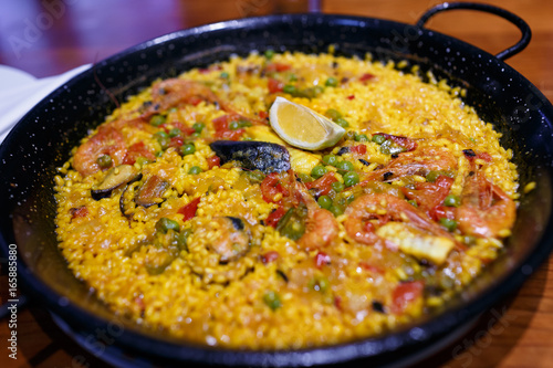 Traditional spain dish, Paella with seafood. Shallow depth of field.