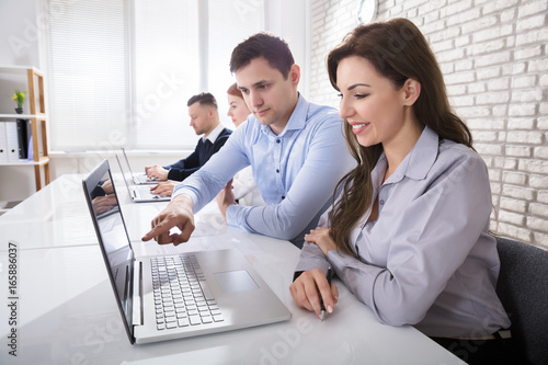 Businessman Working With Colleagues