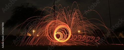 Creating spirals and raining fire with steel wool photography.