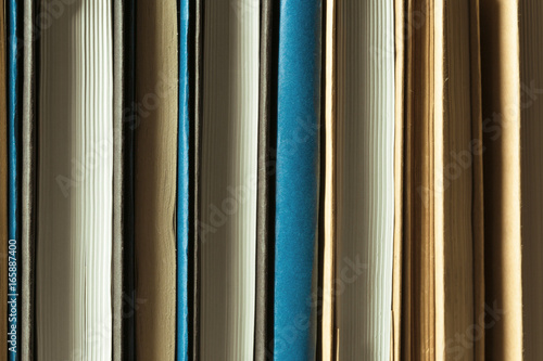 Books close up on old wooden table