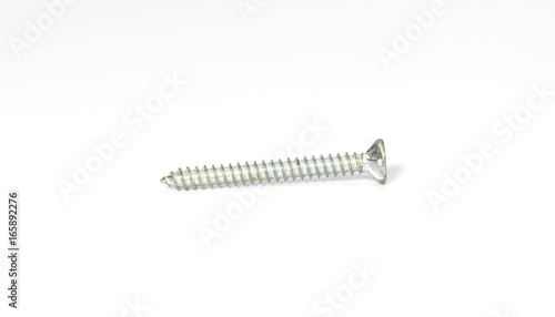 Close up screw on white background