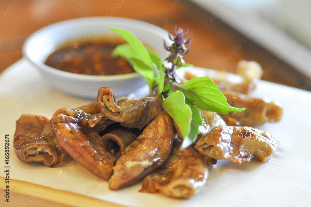 grilled chitterlings or roast chitterlings ภาพถ่ายสต็อก Adobe Stock