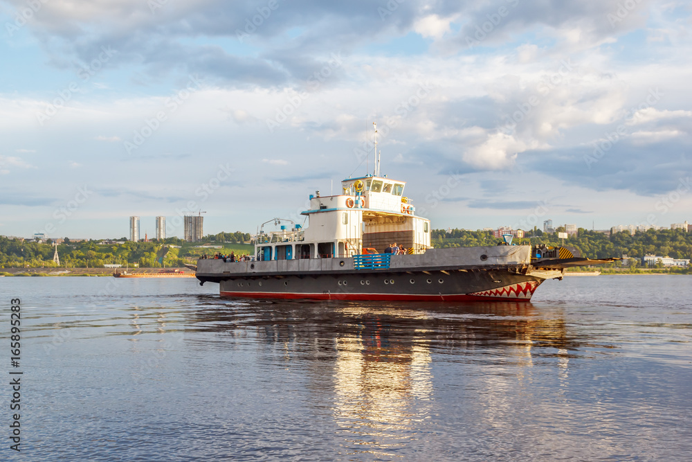 The ferry is reflected in the Volga River near Nizhny Novgorod