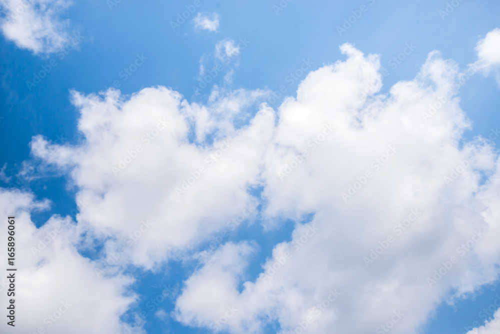 Fantastic soft white clouds against blue sky background