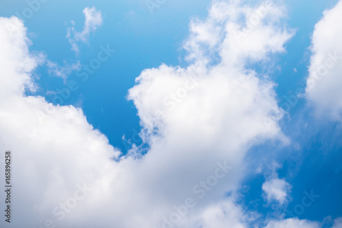 Fantastic soft white clouds against blue sky background