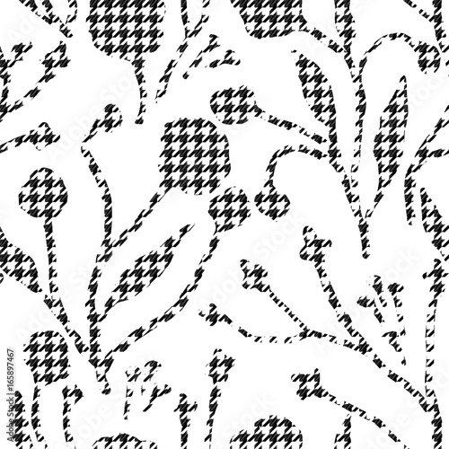 Abstract flowers with hounds-tooth plaid pattern.