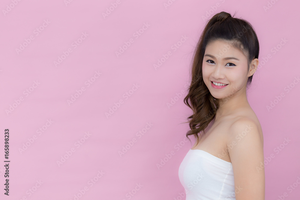 Asian beauty women smile and happiness isolated on pink background Asian beauty women smile and happiness isolated on pink background