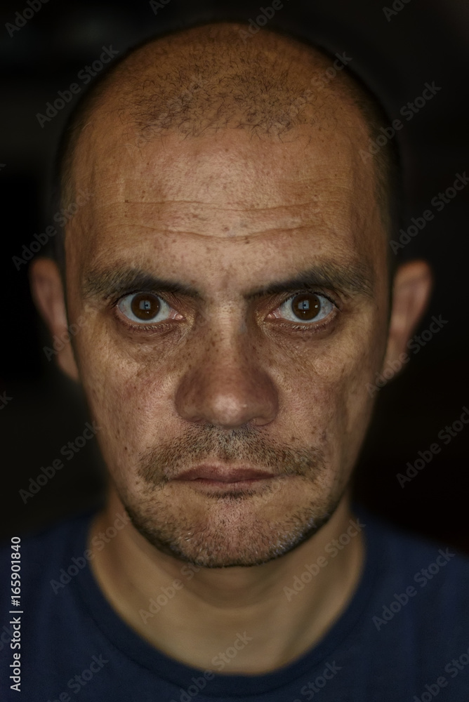Portrait of a man on a dark background Portrait of a man on a dark background