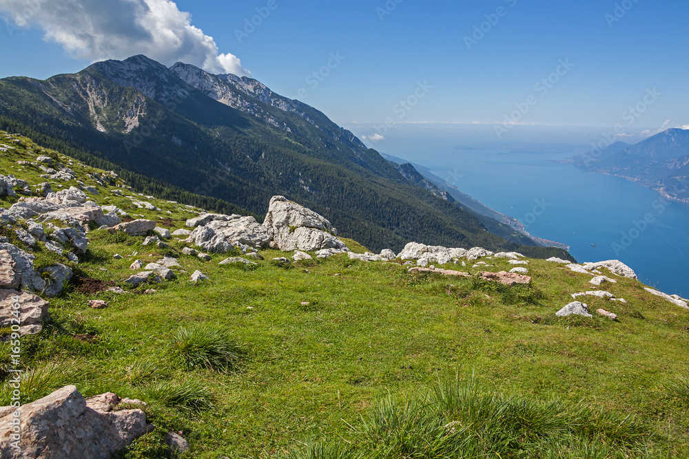 Breathtaking panoramic view to the largest Europe mountain Garda Lake opens from slope of mount  Monte Baldo, Riva del Garda, Italy