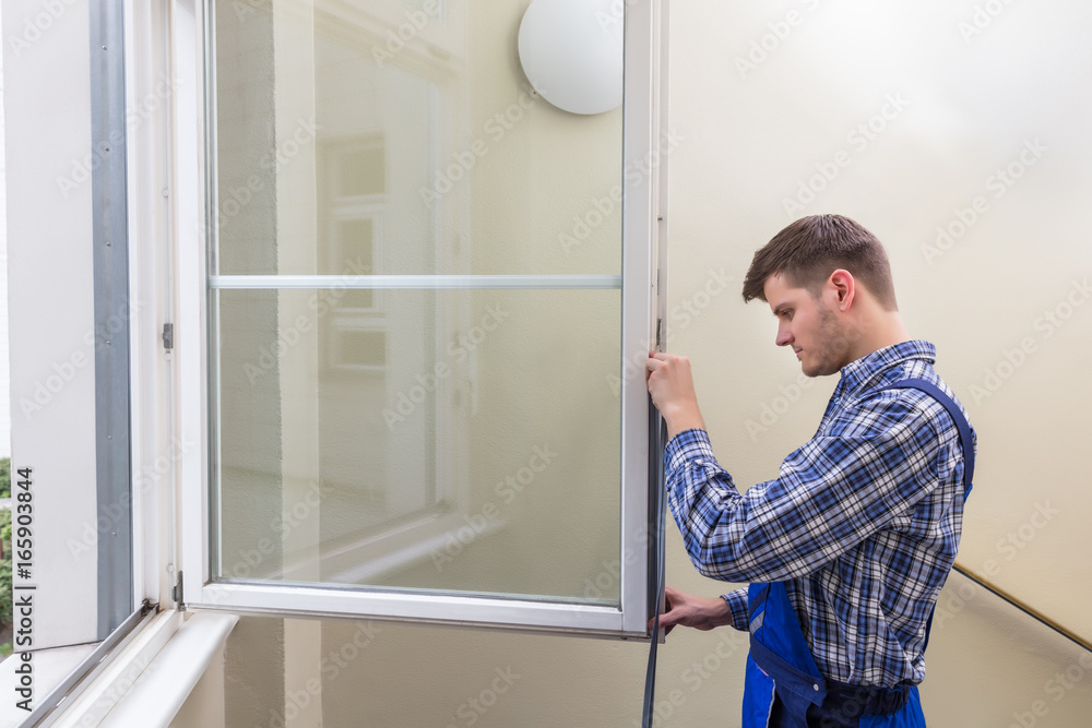 Repairman Fixing Window Repairman Fixing Window