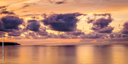 Fototapeta Naklejka Na Ścianę i Meble -  Sunset overlooking the North Sea, in Filey, North Yorkshire, England