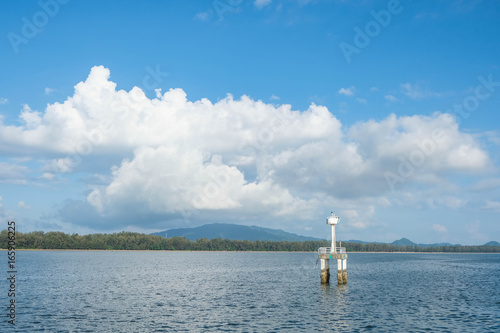 OBSERVATORY IN THE SEA WITH CLOUDY SKY