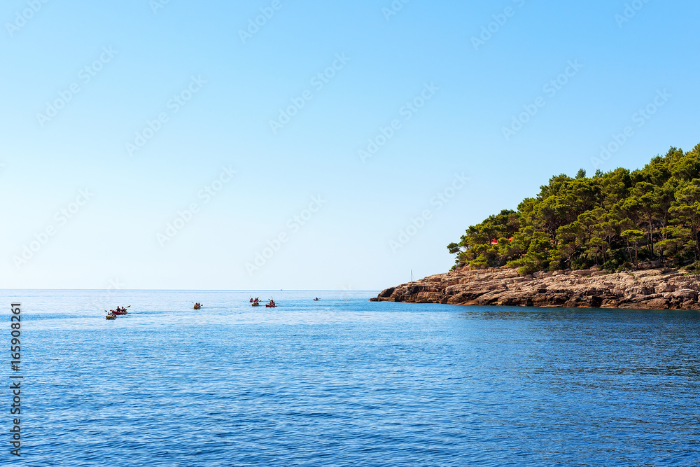 Canoeing at Dalmatian Coast of Adriatic Sea in Dubrovnik Croatia