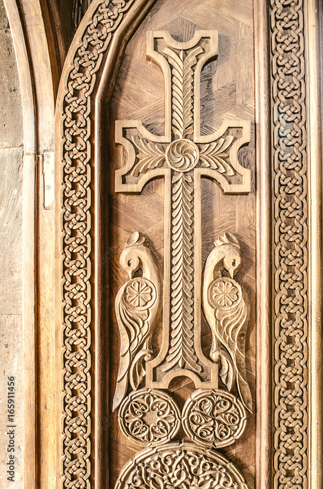 Carved cross on the front wooden door in the Church of the Martyr Gayane in Echmiadzin
