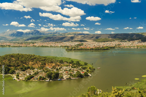 Giannena city in July clouds colors mountain lake Pamvotis, Epirus Greece