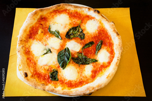 Margherita pizza in pizzeria of Florence photo