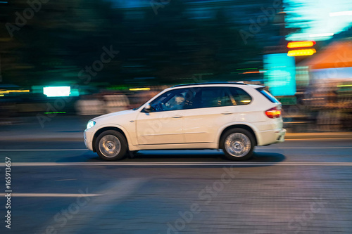Running car in motion in Vilnius