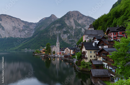 Classic postcard view of famous Hallstatt lakeside town in the Alps on a beautiful sunny day in the summer, Salzkammergut region, Austria