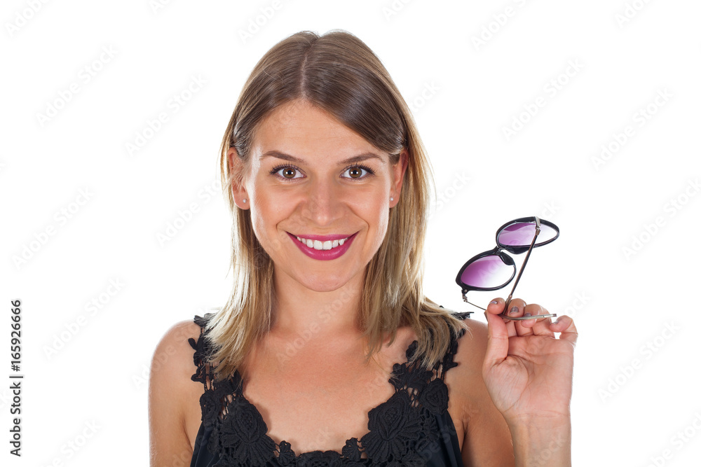Attractive woman holding her sunglasses - isolated Attractive woman holding her sunglasses - isolated