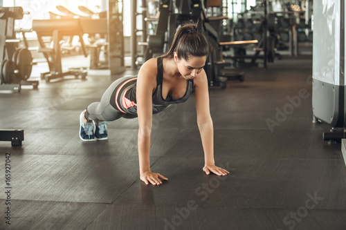 Young woman exercise in the gym healthy lifestyle