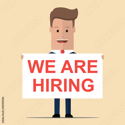 Businessman holding a banner with the inscription we are hiring. Vector illustration