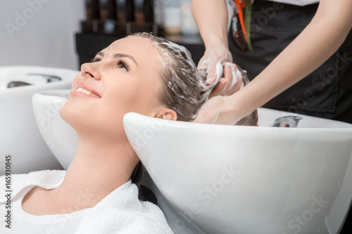  Young women sitting in beauty hair salon style