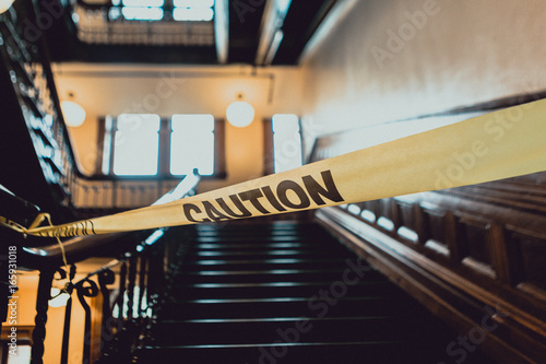 Caution Tape in Front of Stairs