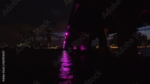 Night Aerial of Miami Beach Causeway with Purple light on Bridge