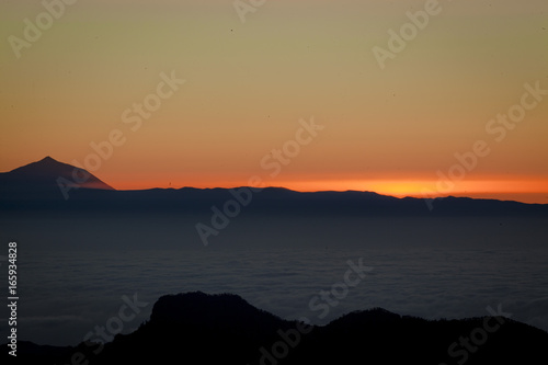 Beautiful sunset in the mountains. Canary Islands. The top of Terenif