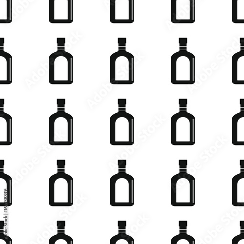 Cognac bottles seamless pattern vector illustration background. Black silhouette alcohol stylish texture. Repeating Bottles seamless pattern background for alcohol design and web