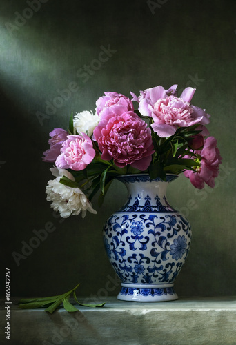 Still life with pink peonies in a chinese vase