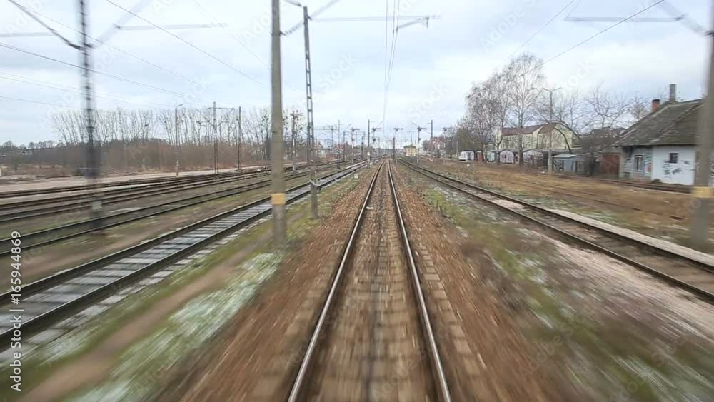 Railroad track running through coutry landscapes Railroad track running through coutry landscapes