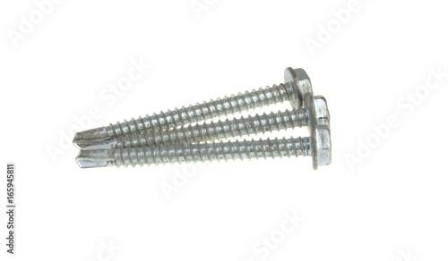 Self-tapping screw on metal on a white background