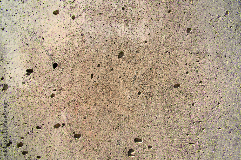 Texture of a cement wall with holes Texture of a cement wall with holes