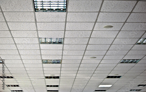 White false ceiling and incorporated lamps