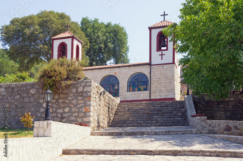 View of Serb Orthodox Christian Monastery of Dajbabe, the church is located in the cave. Podgorica, Montenegro