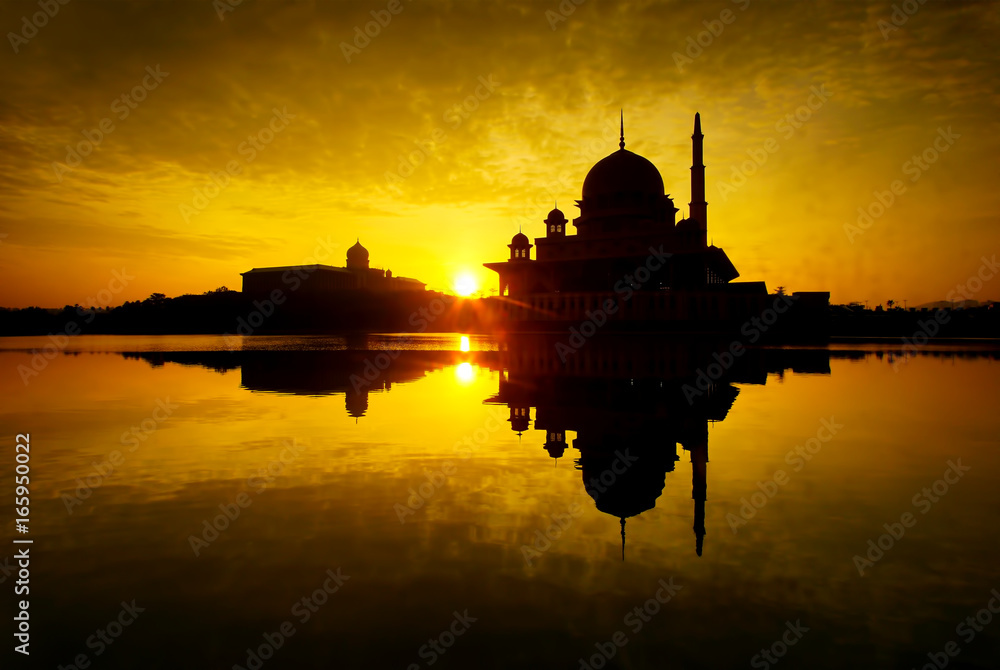 Breathtaking sunrise views with Putra Mosque, Putrajaya,  Malaysia. Charming Islamic architecture.