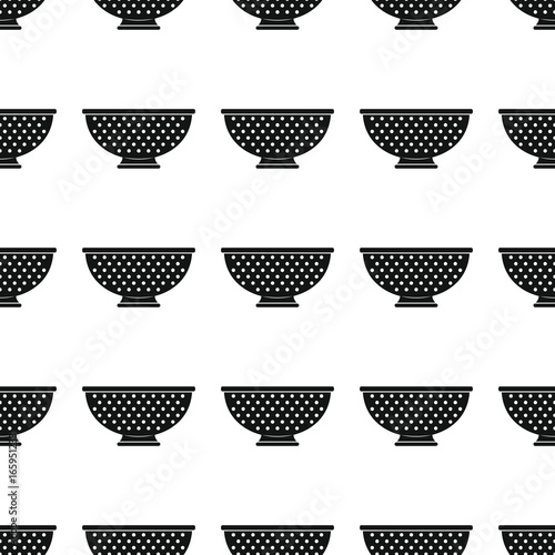Colander seamless pattern vector illustration background. Black silhouette colander stylish texture. Repeating colander seamless pattern background for kitchen design and web